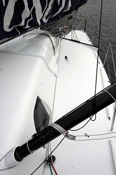 The deck spreaders attached to the side of the cabintop and are used as a sheeting point for headsails. Note the cute dome in the side of the cabintop