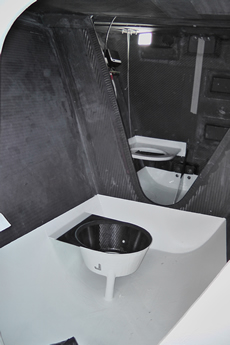 Two heads? In fact the one in the foreground will hold the seat for the media station, the one behind it, the bucket