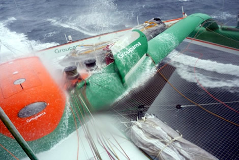 Groupama 3 - Cammas gets a dunking. Photo &copy;; Groupama
