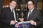 Chris Dawson, Commodore of the Royal London Yacht Club (left) exchanging pennants with Mike Lilwall, Director of Charles Stanley Group PLC